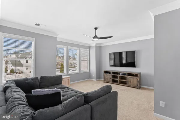 a very nice looking room with a table and a workspace