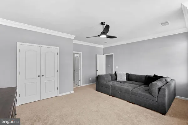 a view of a house with backyard sitting area and garden