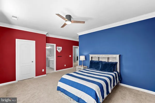 a view of a patio with iron fence