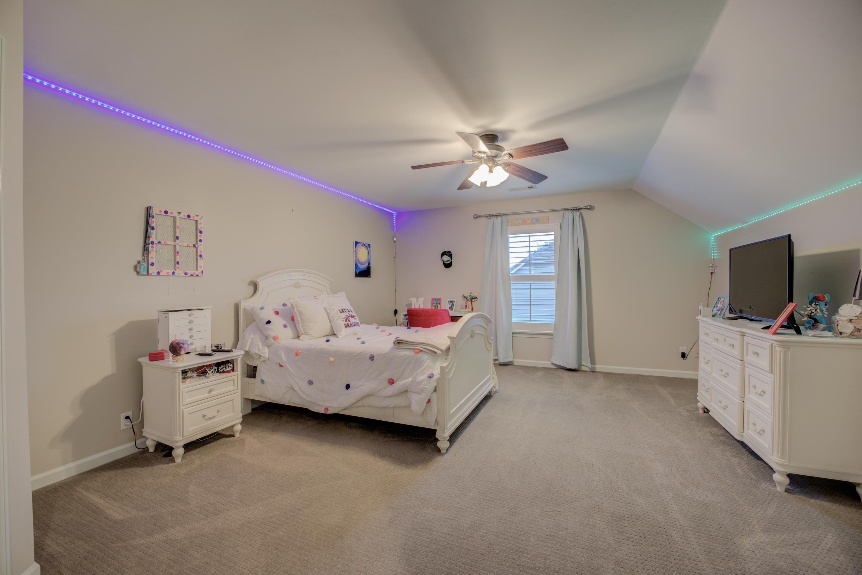 9852 Garden Place Collierville, TN 38139 - Photo 26 of 38 a bed room with a bed and a television