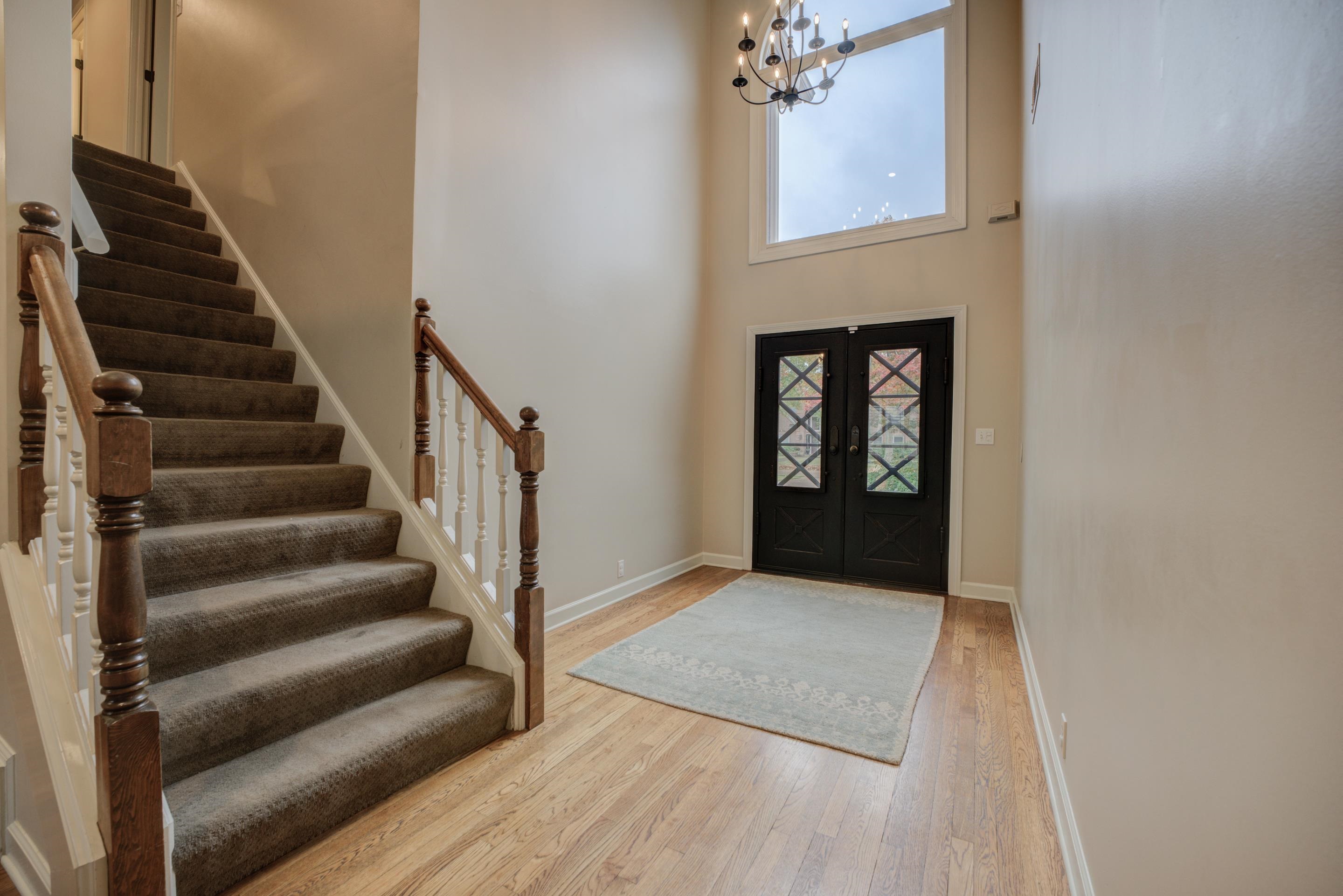 9852 Garden Place Collierville, TN 38139 - Photo 3 of 38 a view of an entryway with wooden floor