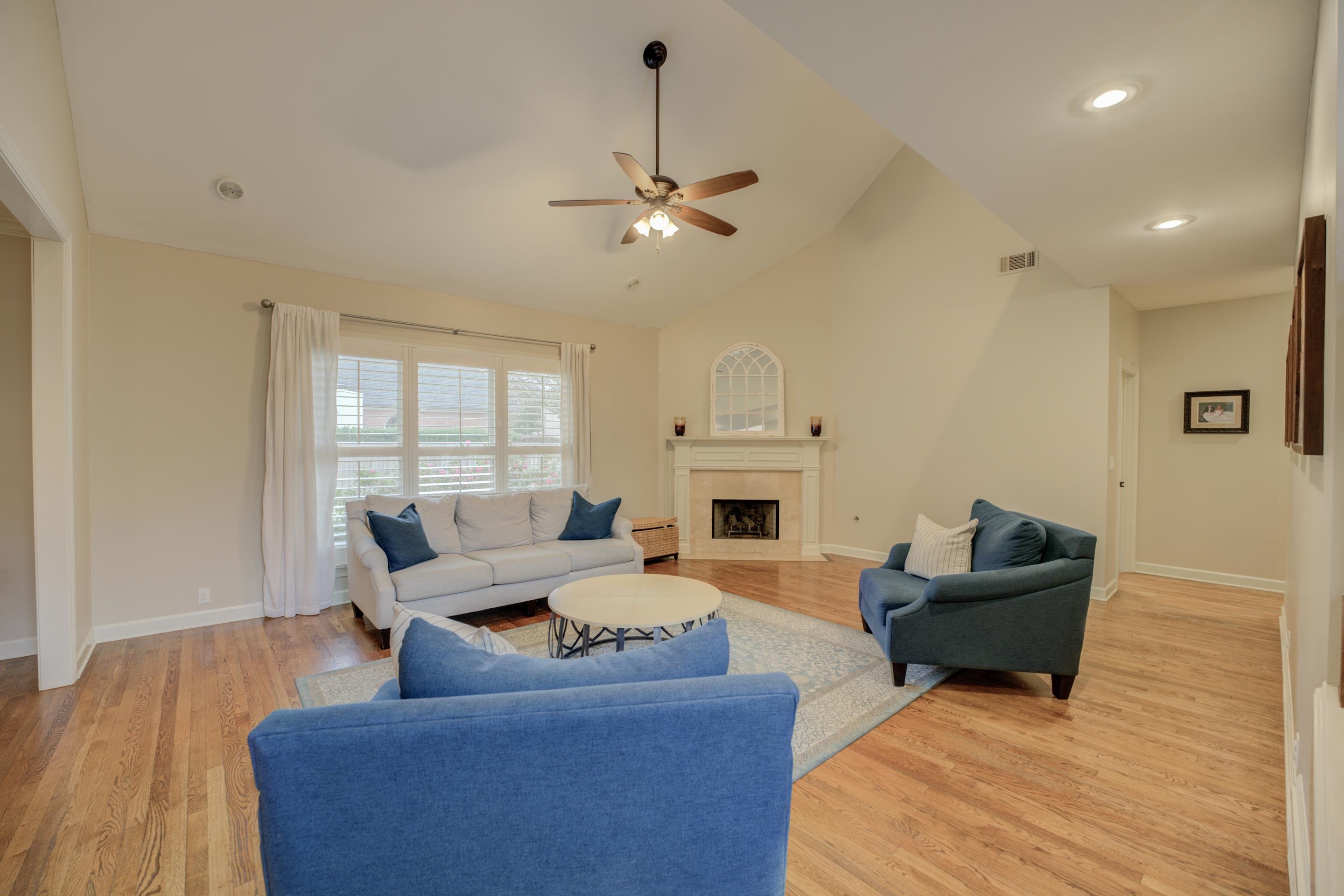 9852 Garden Place Collierville, TN 38139 - Photo 4 of 38 a living room with furniture and a fireplace