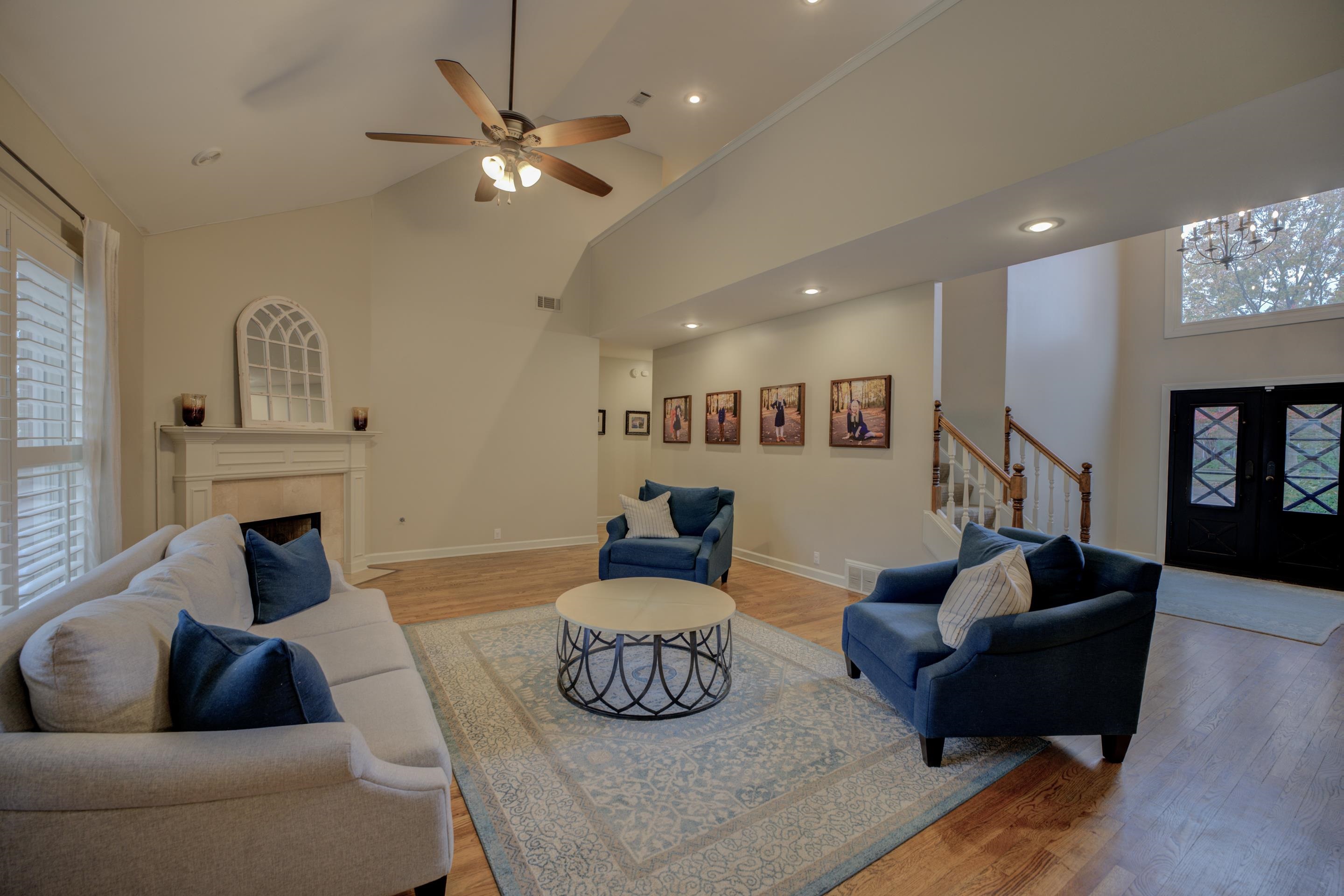 9852 Garden Place Collierville, TN 38139 - Photo 5 of 38 a living room with furniture or couch and a fireplace