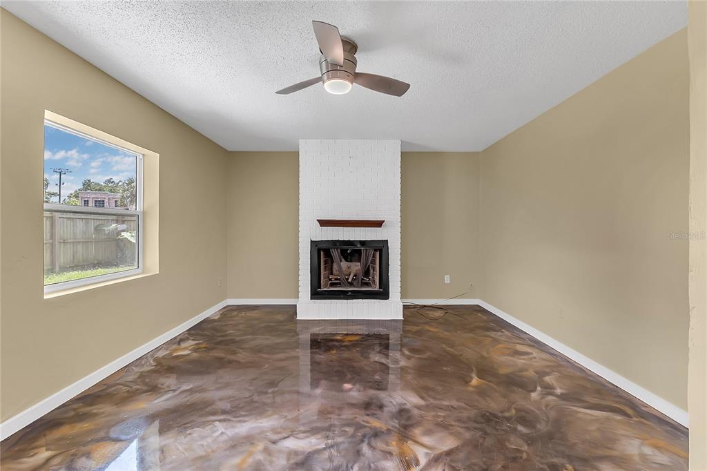 36 Springwood Square Port Orange, FL 32129 - Photo 11 of 31 a view of an empty room with a window