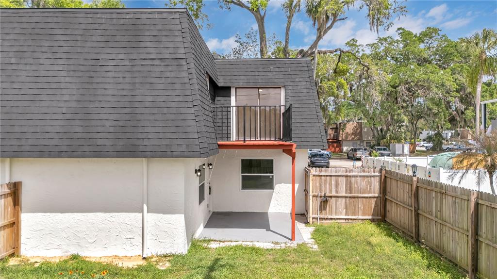 36 Springwood Square Port Orange, FL 32129 - Photo 25 of 31 a front view of a house with a yard