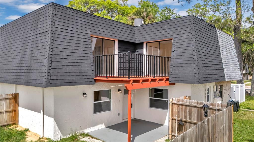 36 Springwood Square Port Orange, FL 32129 - Photo 26 of 31 a front view of a house with glass windows