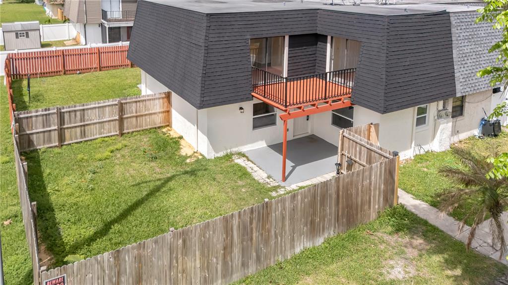 36 Springwood Square Port Orange, FL 32129 - Photo 28 of 31 a backyard of a house with lots of green space