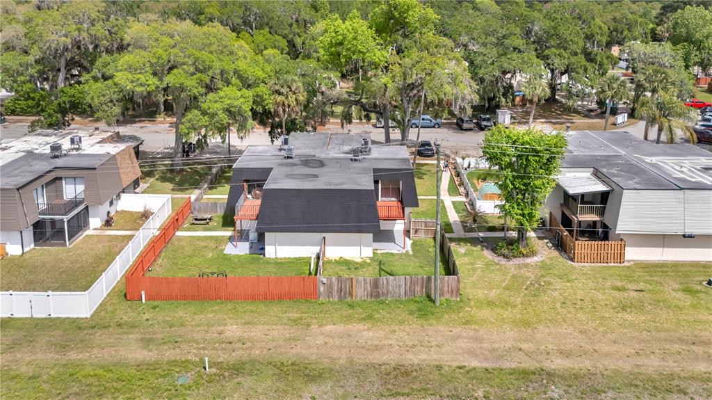 36 Springwood Square Port Orange, FL 32129 - Photo 31 of 31 a view of backyard with swimming pool and seating