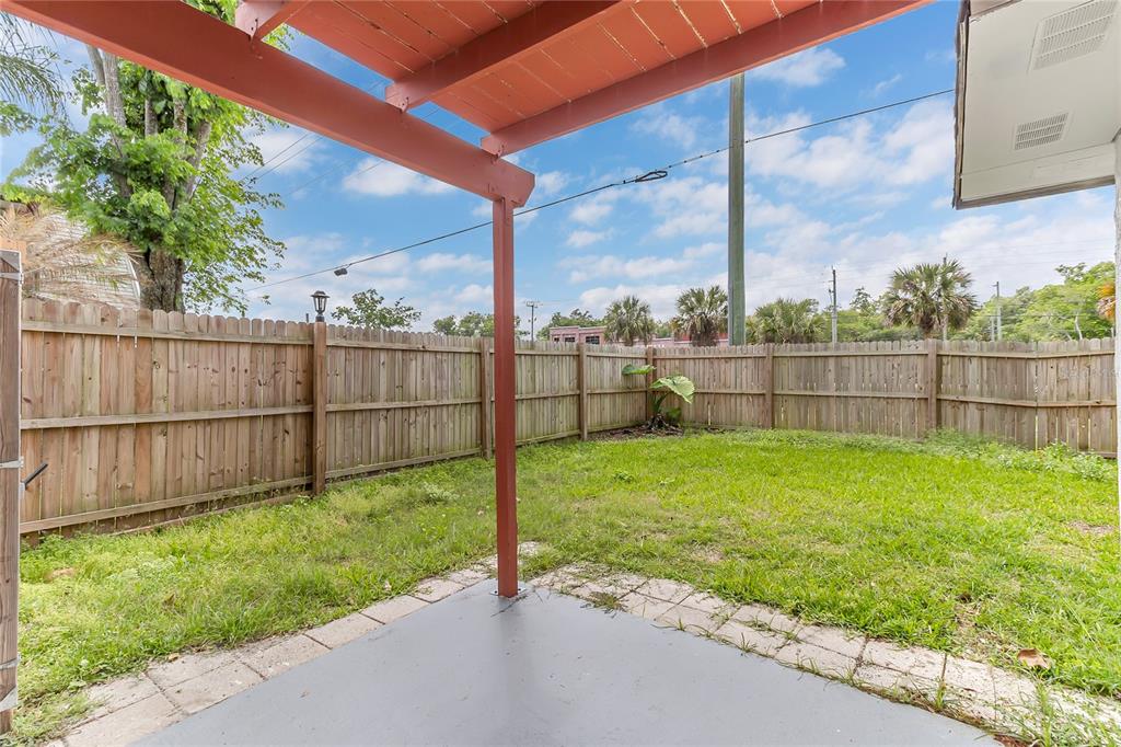 36 Springwood Square Port Orange, FL 32129 - Photo 7 of 31 a view of a backyard with a garden