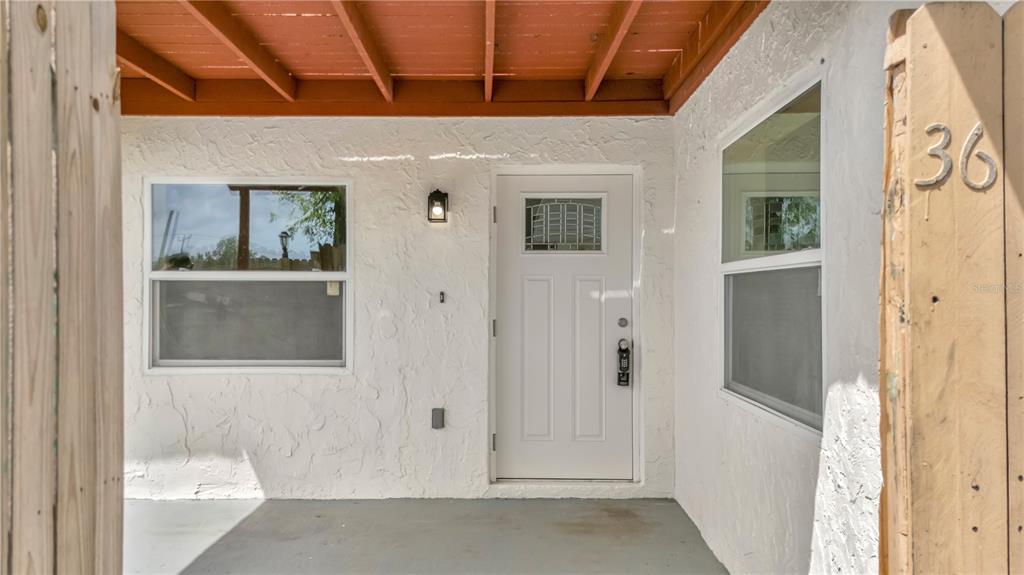 36 Springwood Square Port Orange, FL 32129 - Photo 9 of 31 a view of a door with a door