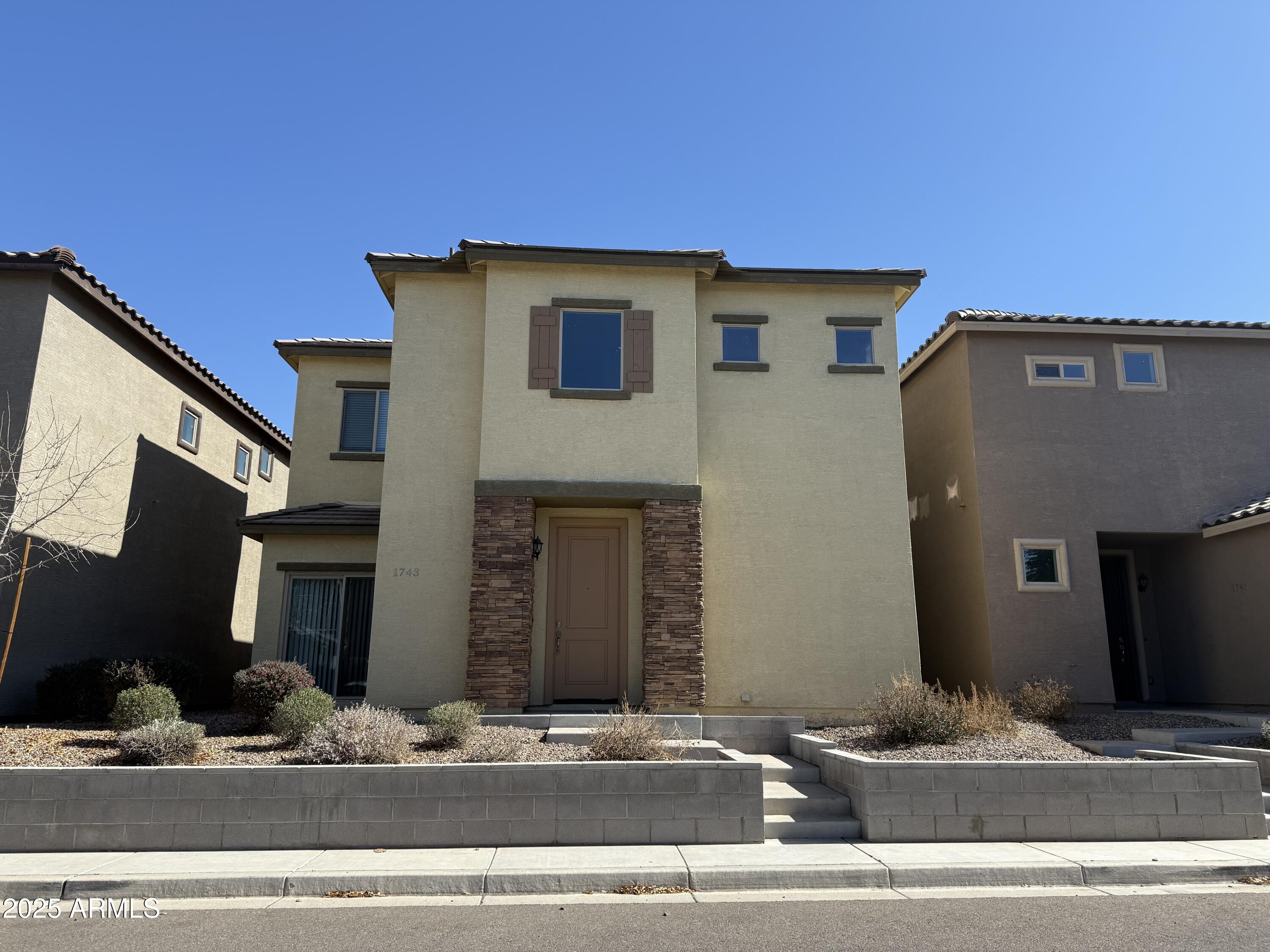 1743 West Pollack Street Phoenix, AZ 85041 - Photo 1 of 46 a view of a house with a terrace patio