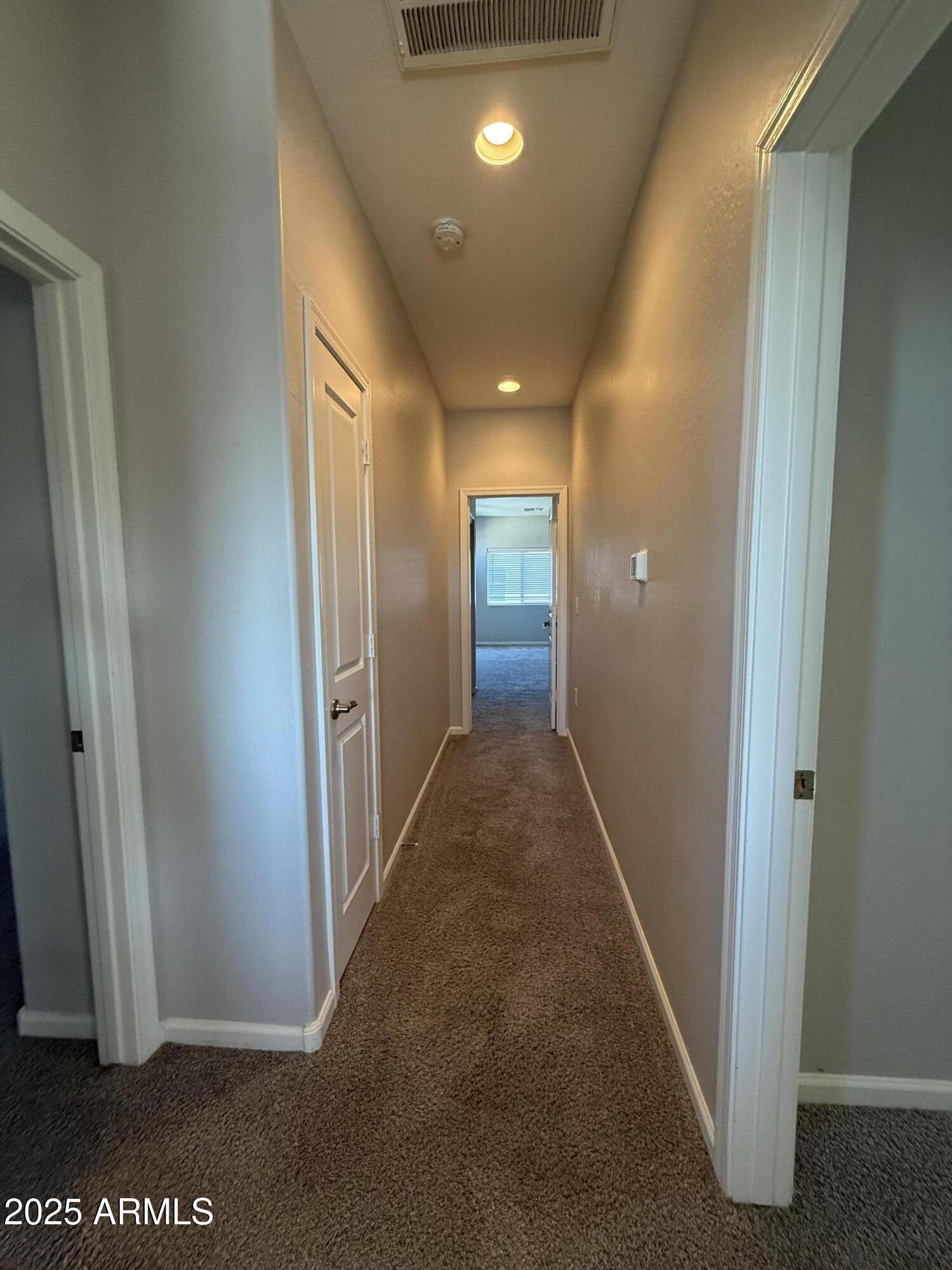 1743 West Pollack Street Phoenix, AZ 85041 - Photo 37 of 46 a view of a hallway