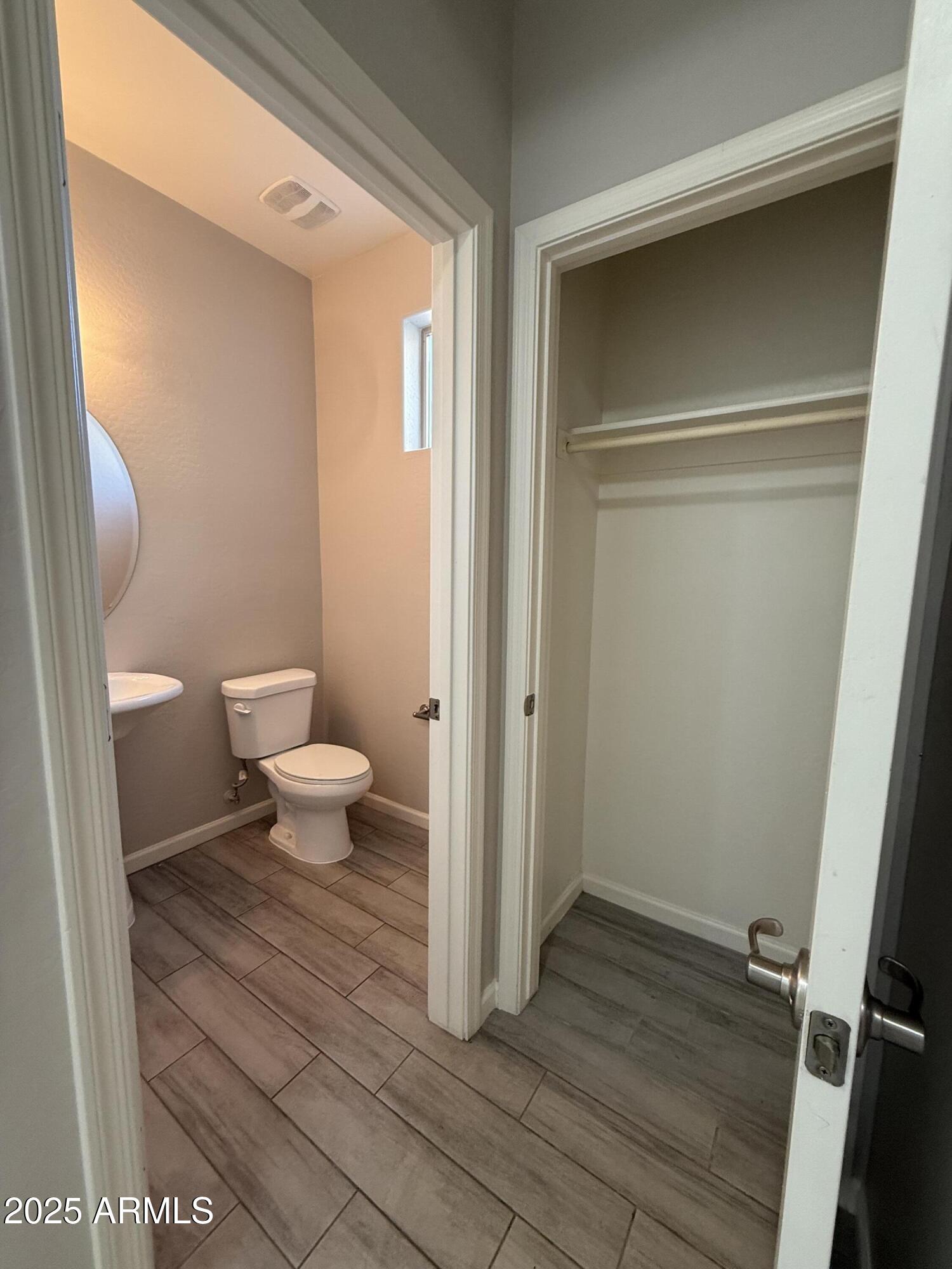 1743 West Pollack Street Phoenix, AZ 85041 - Photo 4 of 46 a bathroom with a toilet and a shower