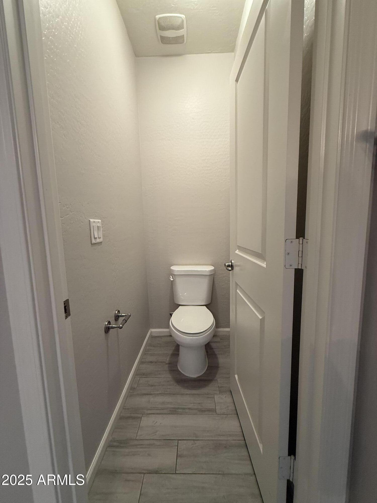 1743 West Pollack Street Phoenix, AZ 85041 - Photo 43 of 46 a bathroom with a toilet