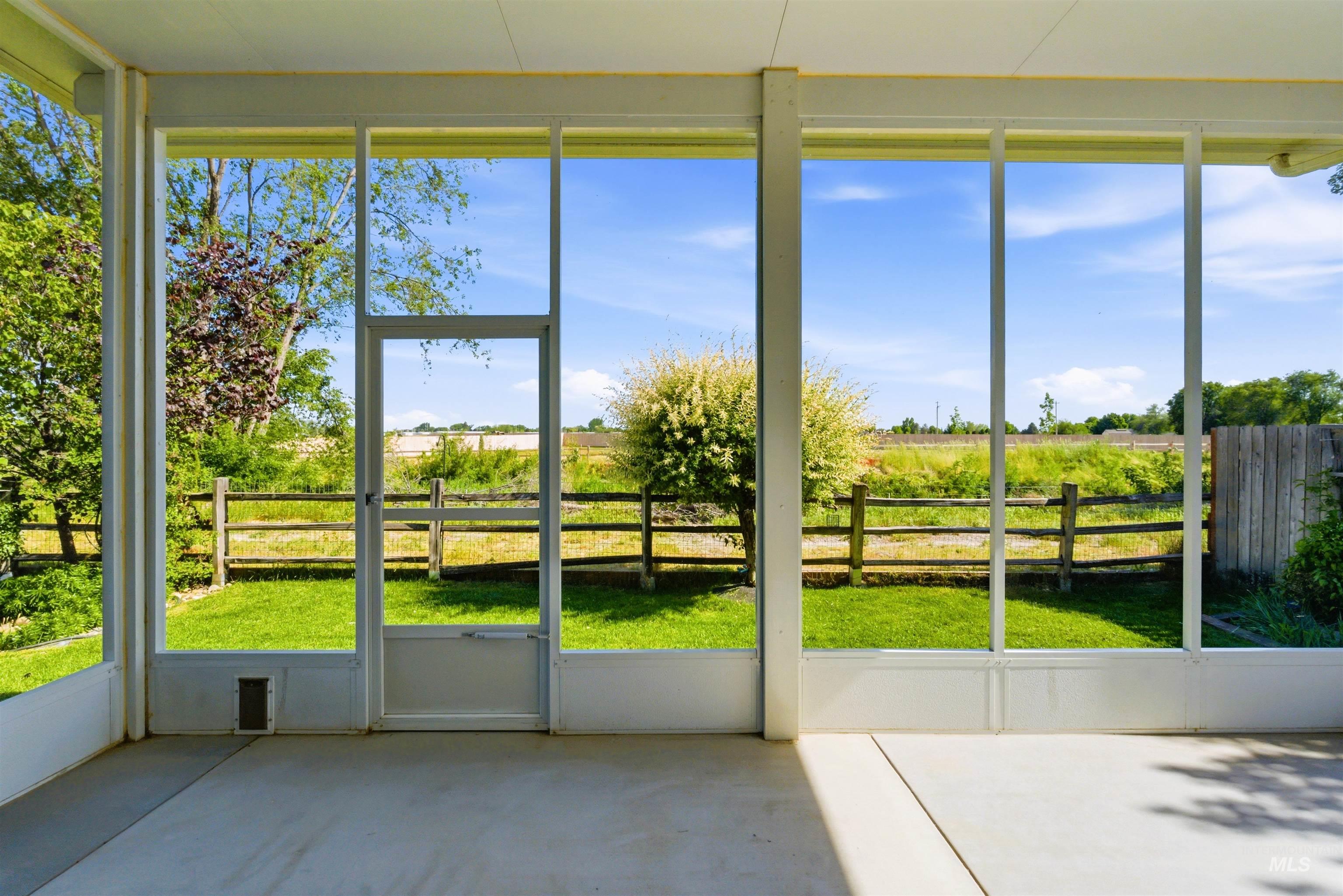 1555 Condor Drive Middleton, ID 83644 - Photo 3 of 50 Screened-in patio with concrete flooring