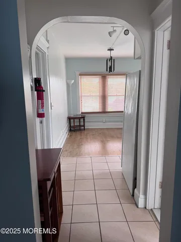 a view of livingroom with furniture and window