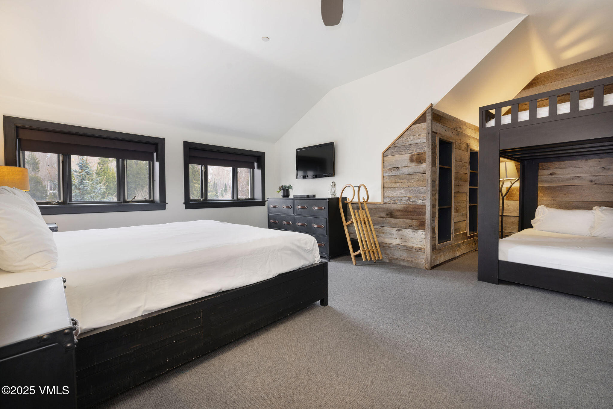 180 Daybreak Ridge Road, Unit 711 Beaver Creek, CO 81620 - Photo 11 of 17 a spacious bedroom with a large bed and a large window