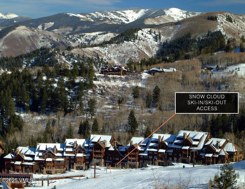 180 Daybreak Ridge Road, Unit 711 Beaver Creek, CO 81620 - Photo 15 of 17 a view of outdoor space with patio furniture and lake view