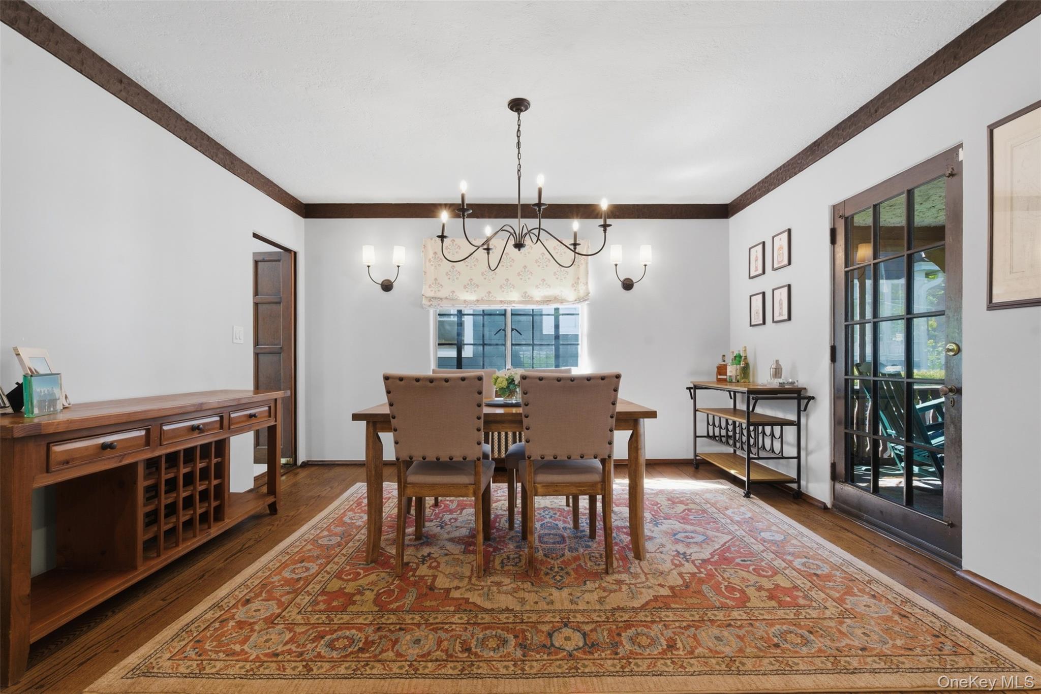 15 Kingsbury Road New Rochelle, NY 10804 - Photo 7 of 30 a view of a dining room with furniture window and wooden floor
