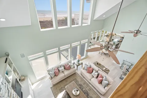 a view of balcony with wooden floor