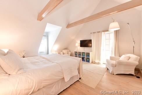 23 Painter Hill Road Roxbury, CT 06783 - Photo 16 of 26 a spacious bedroom with a bed and a flat screen tv