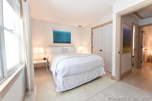 23 Painter Hill Road Roxbury, CT 06783 - Photo 18 of 26 a bedroom with a bed and a window