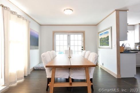 23 Painter Hill Road Roxbury, CT 06783 - Photo 9 of 26 a view of a dining room with furniture and wooden floor