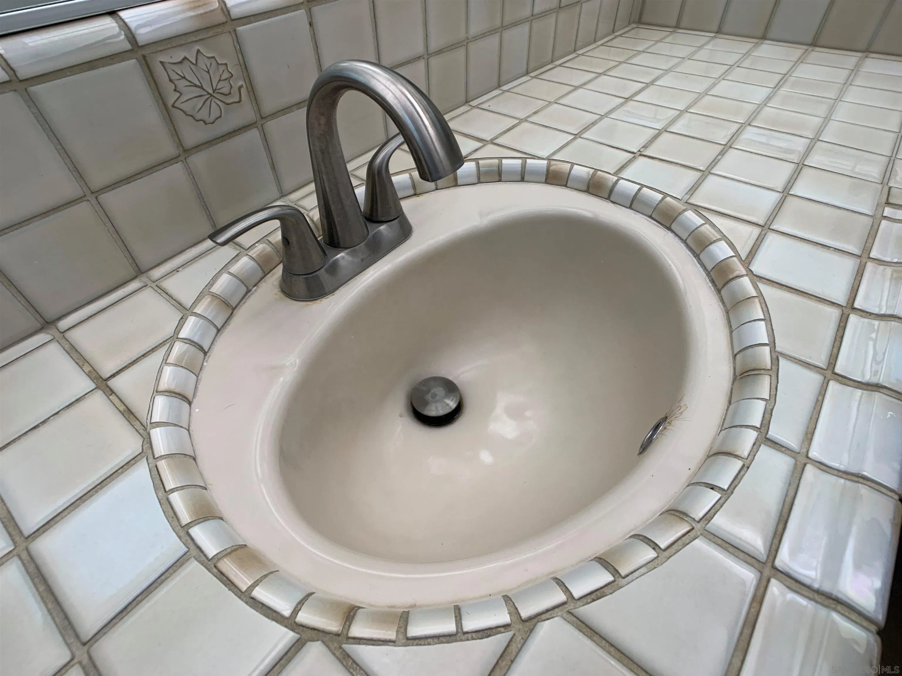 1394 Peutz Valley Road Alpine, CA 91901 - Photo 37 of 75 Tiled hallway bathroom sink area.