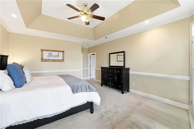 a bedroom with furniture and a window