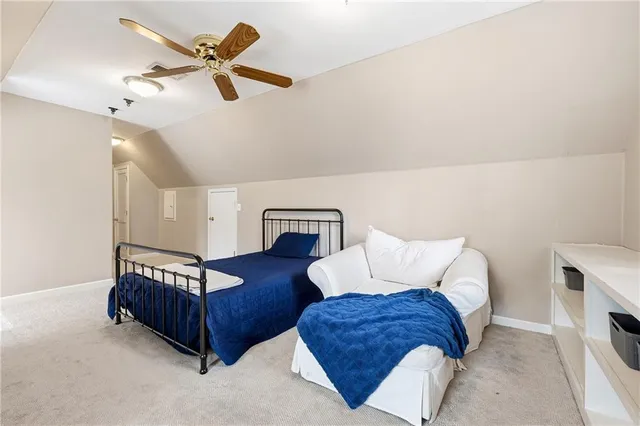 a view of balcony with wooden floor and seating space