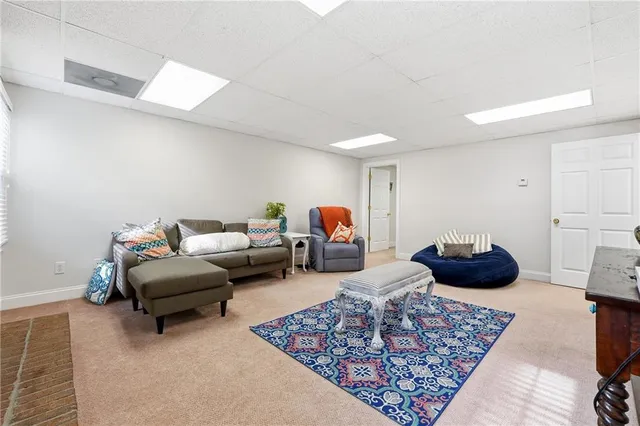 an aerial view of residential building with parking space