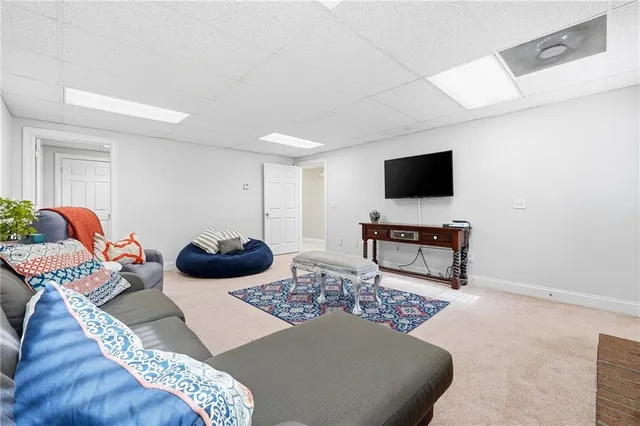 a backyard of a house with lots of green space and shower