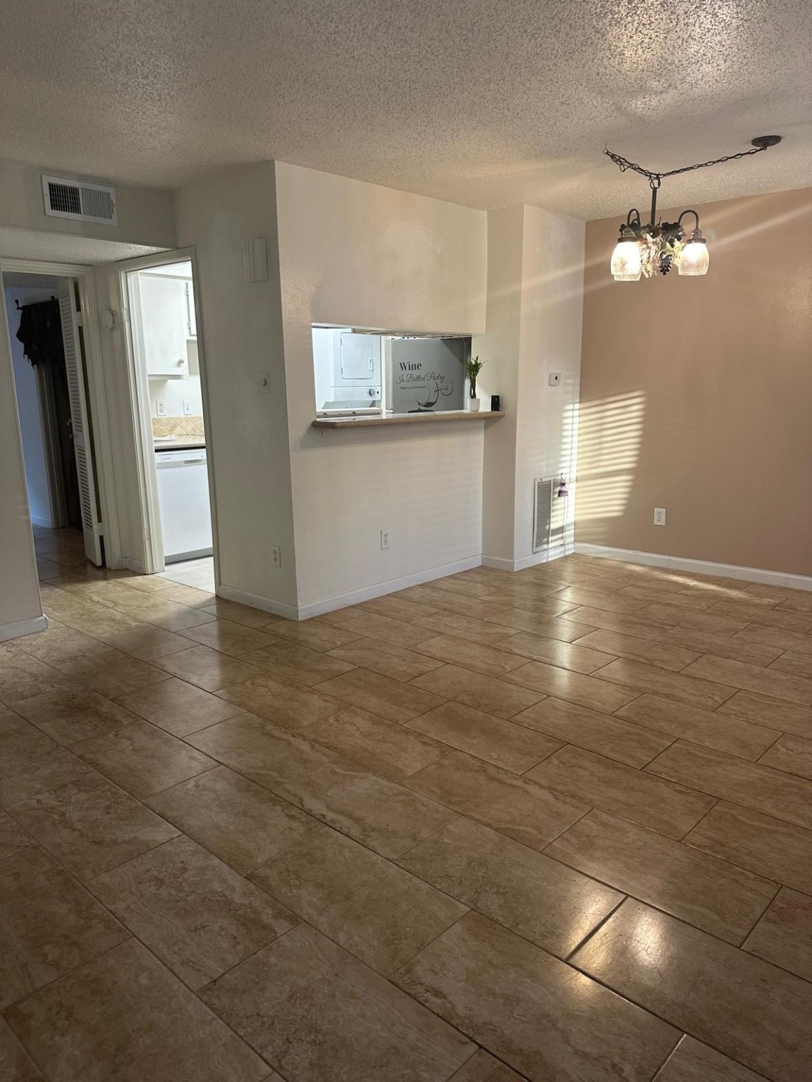 6410 Del Monte Drive, Unit 114 Houston, TX 77057 - Photo 2 of 27 a view of a livingroom with a kitchen