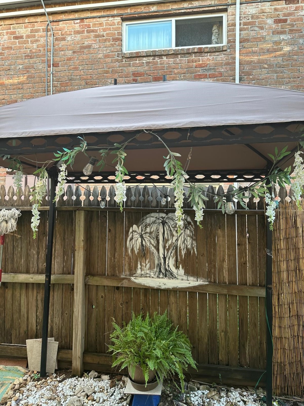 6410 Del Monte Drive, Unit 114 Houston, TX 77057 - Photo 26 of 27 a front view of a building with a garden