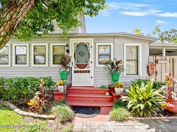 608 Indiana Avenue St. Cloud, FL 34769 - Photo 13 of 20 front view of a house with a bench