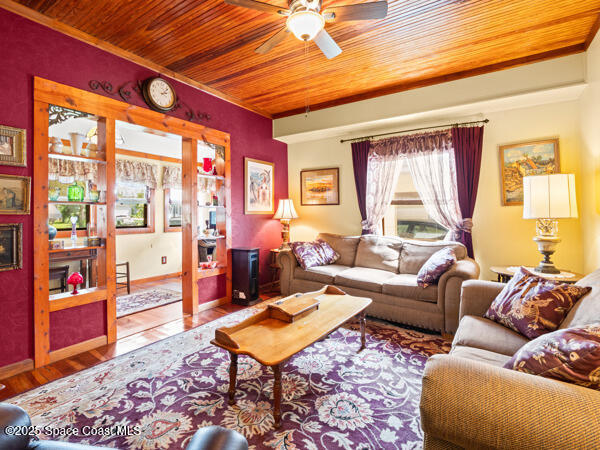 608 Indiana Avenue St. Cloud, FL 34769 - Photo 9 of 20 a living room with furniture a rug and a large window