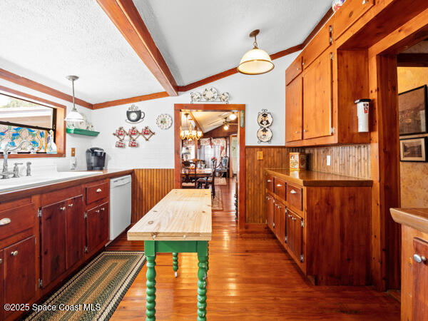 608 Indiana Avenue St. Cloud, FL 34769 - Photo 10 of 20 a large kitchen with stainless steel appliances wooden floor and large windows