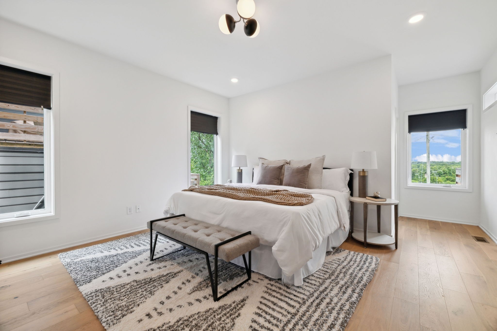 263 Riverside Drive, Unit A Nashville, TN 37206 - Photo 18 of 42 a bedroom with a bed and a window