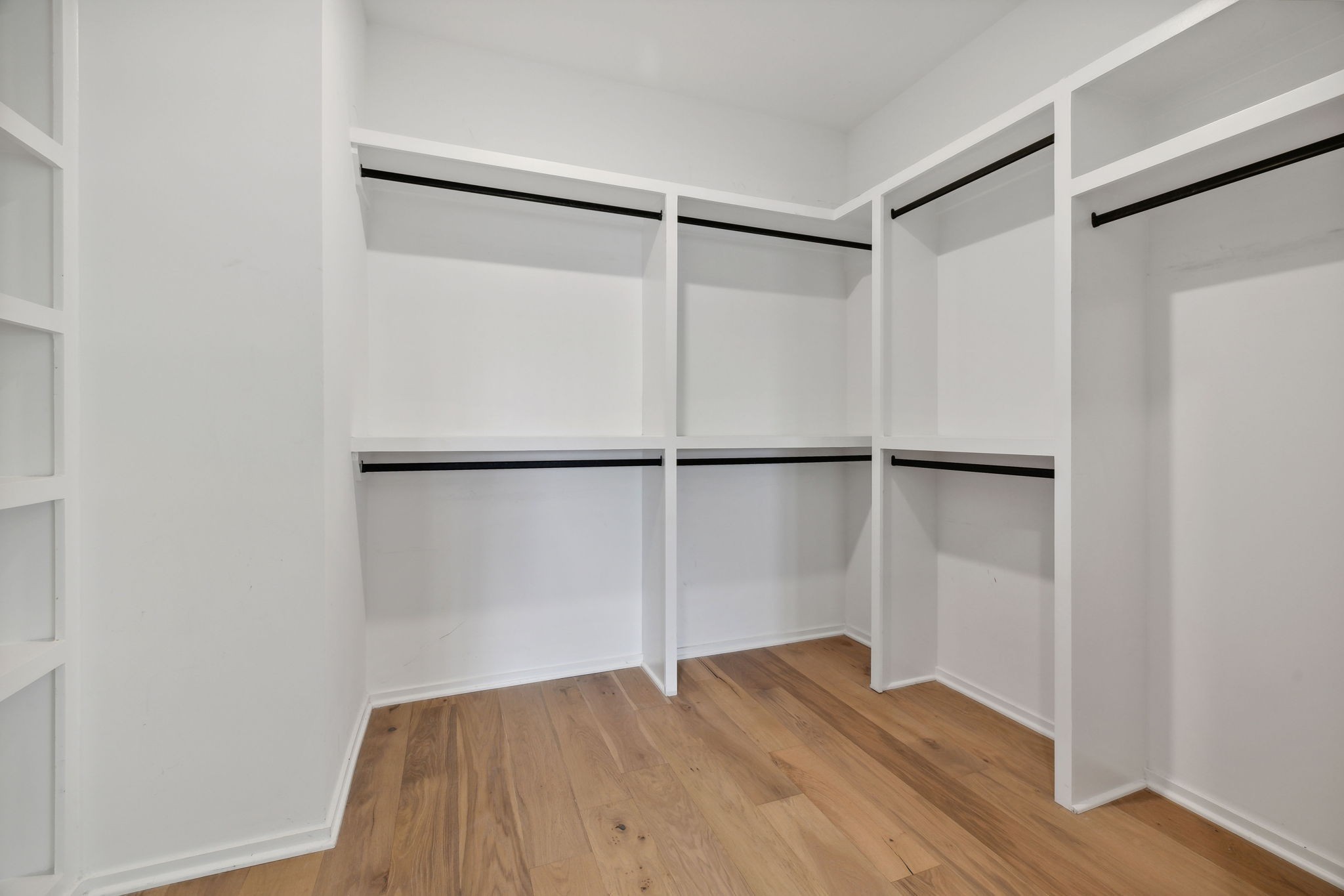 263 Riverside Drive, Unit A Nashville, TN 37206 - Photo 20 of 42 a view of an empty room with wooden floor