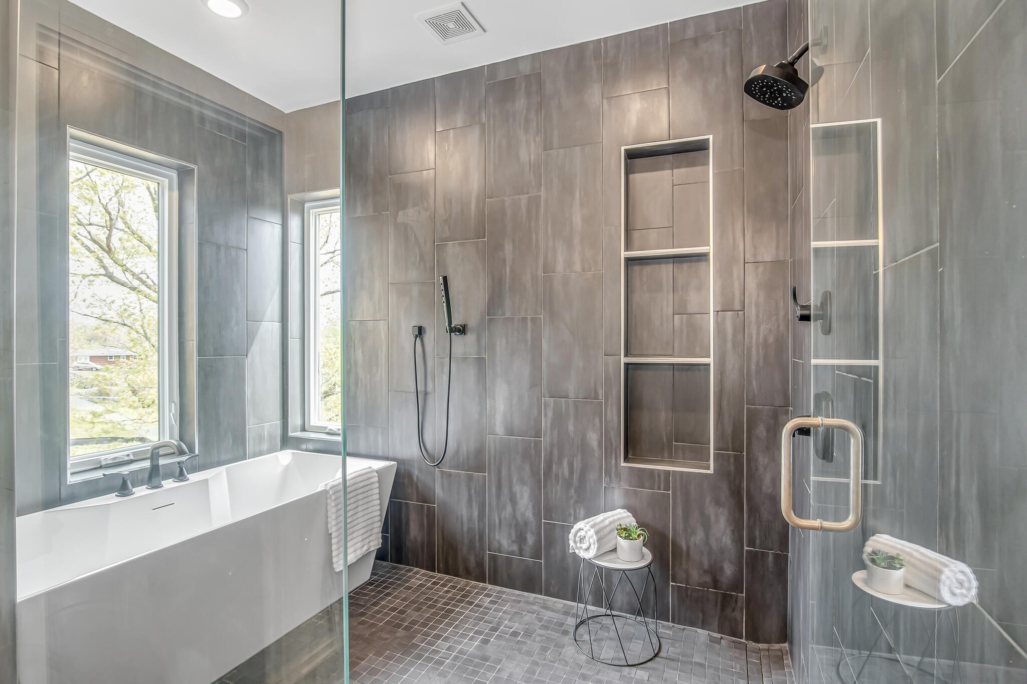 263 Riverside Drive, Unit A Nashville, TN 37206 - Photo 22 of 42 a spacious bathroom with a granite countertop shower a toilet and a sink