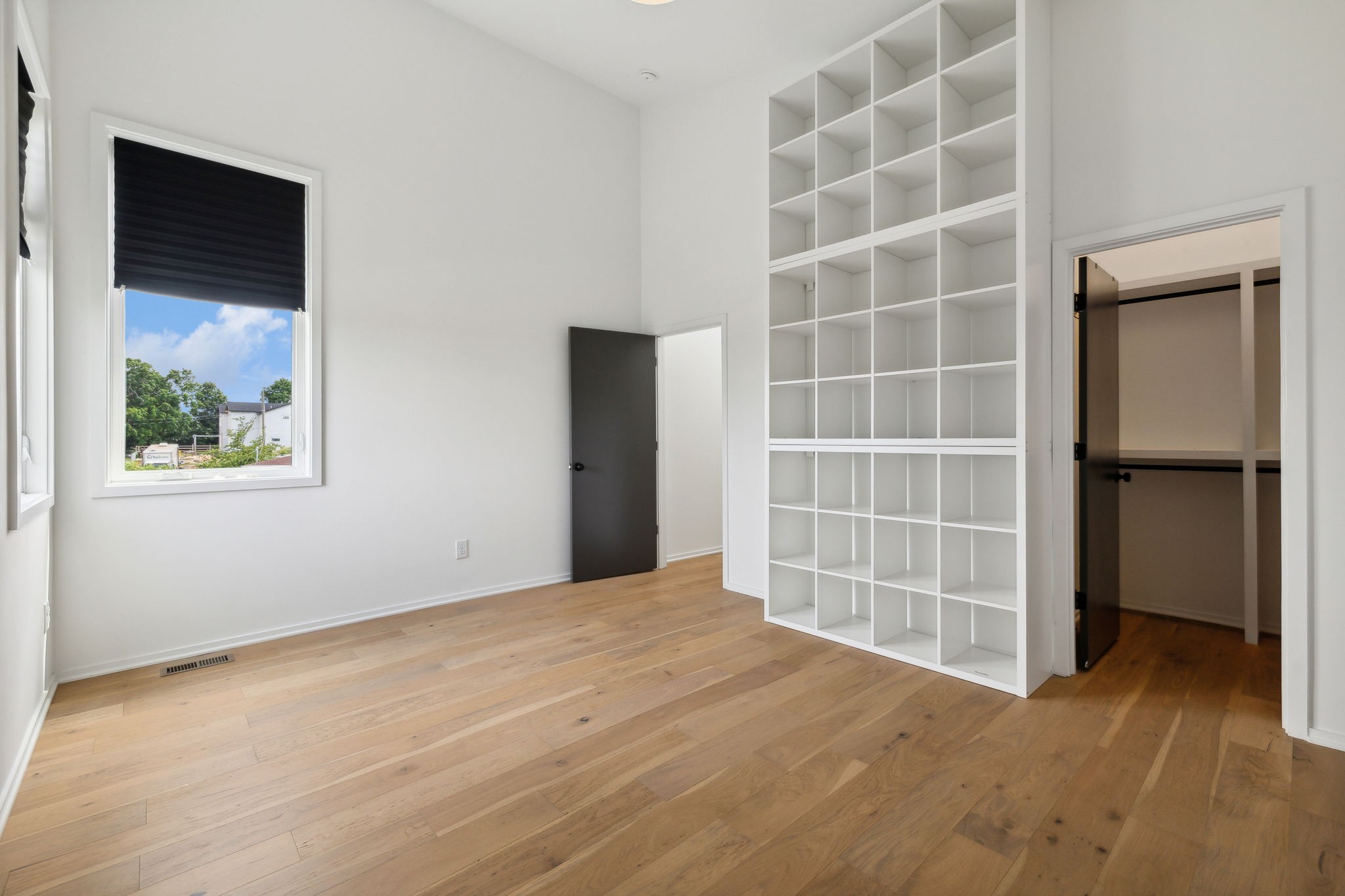 263 Riverside Drive, Unit A Nashville, TN 37206 - Photo 27 of 42 a view of an empty room with a window