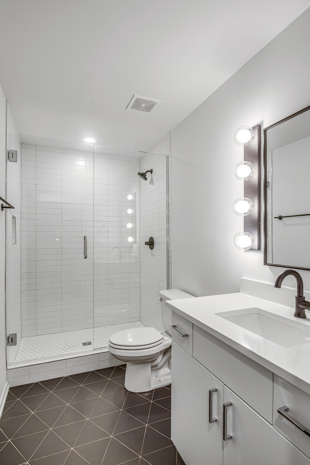 263 Riverside Drive, Unit A Nashville, TN 37206 - Photo 32 of 42 a bathroom with a sink toilet and shower