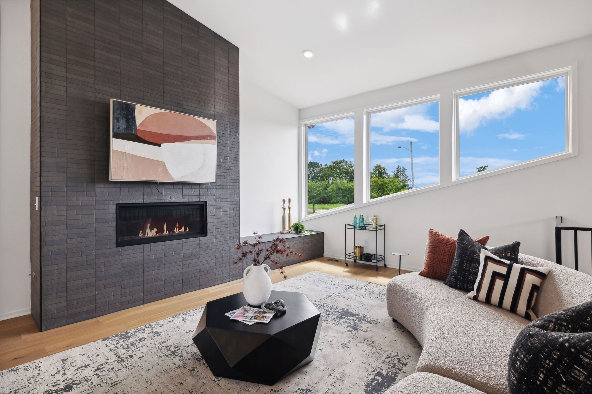 263 Riverside Drive, Unit A Nashville, TN 37206 - Photo 6 of 42 a living room with furniture and a fireplace