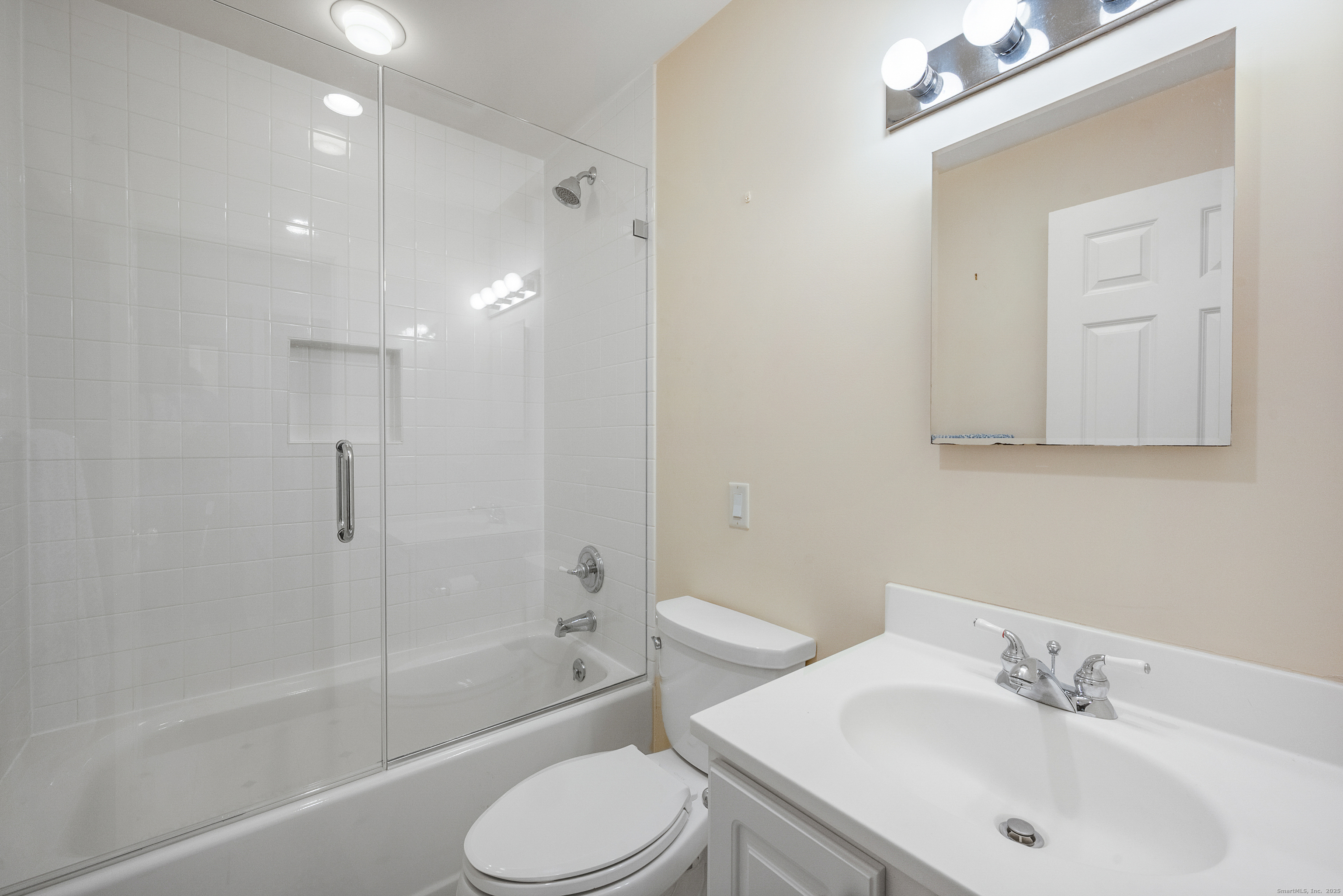 160 Glenbrook Road, Unit 6B Stamford, CT 06902 - Photo 14 of 19 a bathroom with a sink toilet and shower