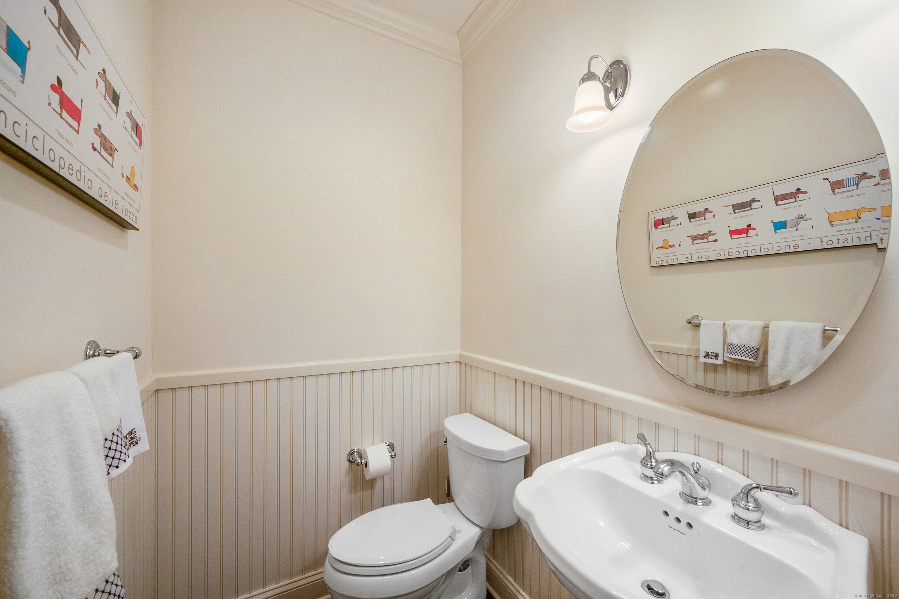 160 Glenbrook Road, Unit 6B Stamford, CT 06902 - Photo 8 of 19 a bathroom with a sink a toilet and a mirror