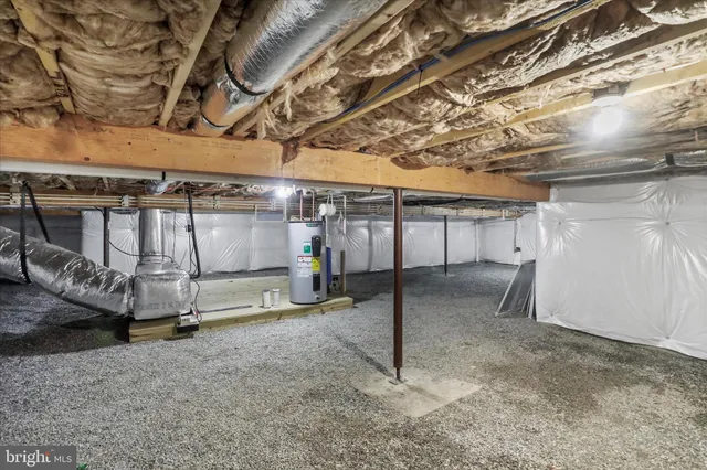 a view of a room with wooden walls