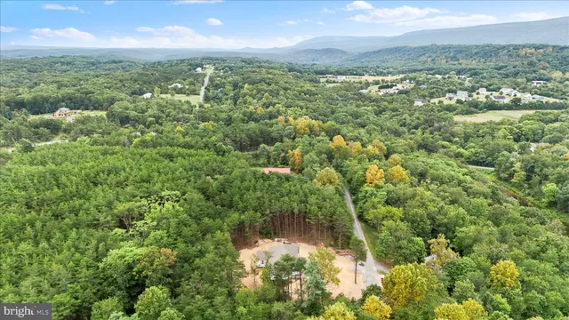 a bathroom with a toilet sink and shower