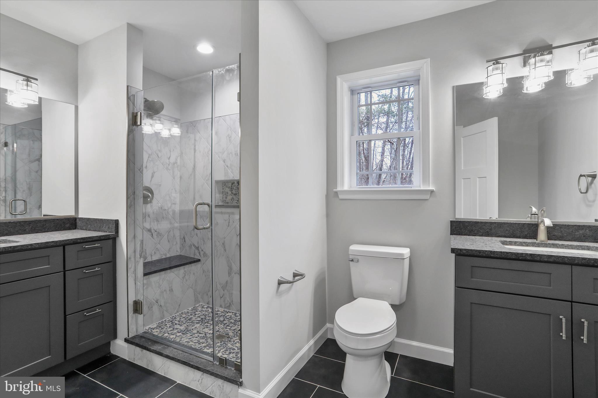 200 Wagon Trail Berkeley Springs, WV 25411 - Photo 30 of 53 a bathroom with a toilet sink and shower