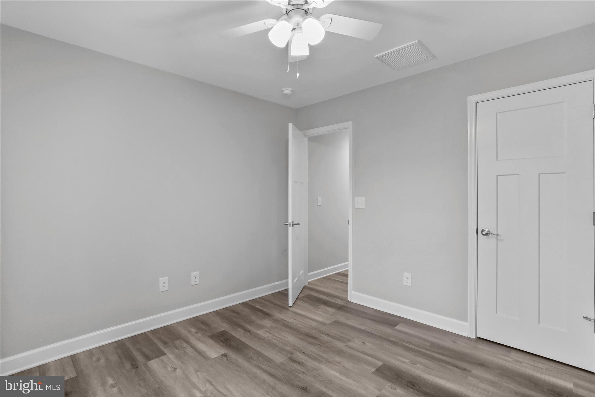 200 Wagon Trail Berkeley Springs, WV 25411 - Photo 36 of 53 wooden floor in an empty room
