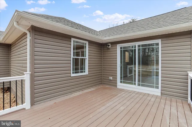 a view of a house with deck